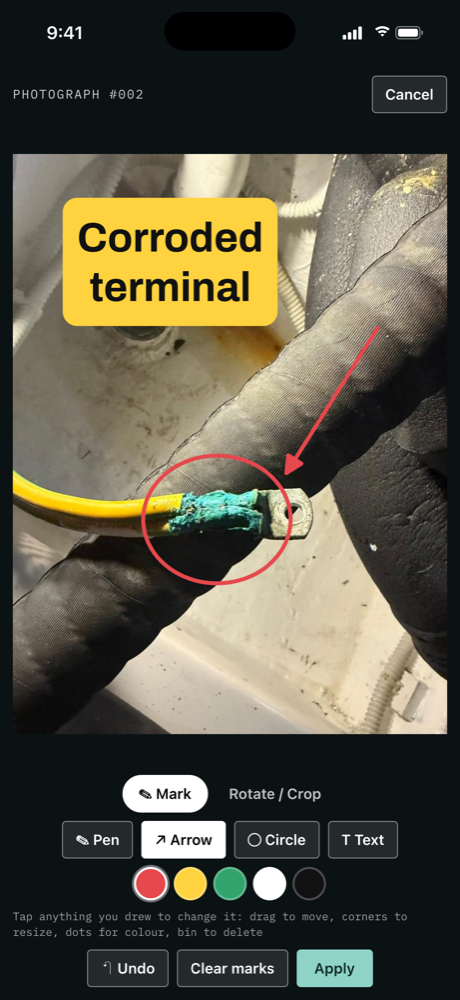 A photograph of a corroded terminal marked with an arrow, a circle and a label, inside Freeboard.